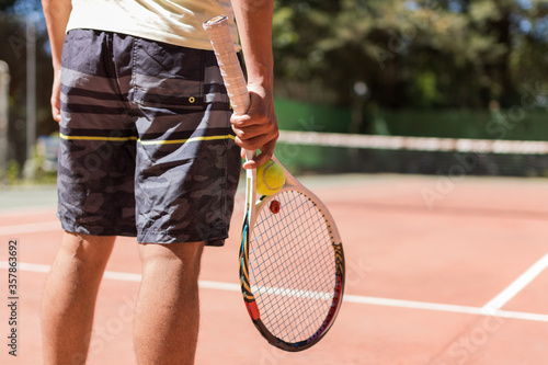 professional tennis player playing with racket