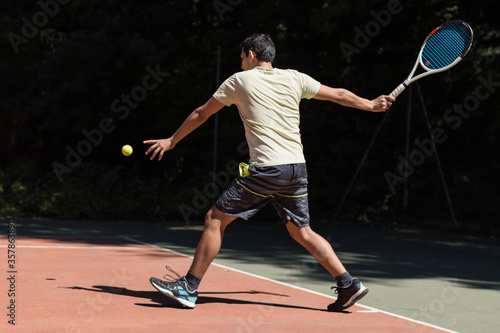 professional tennis player playing with racket © Fabian