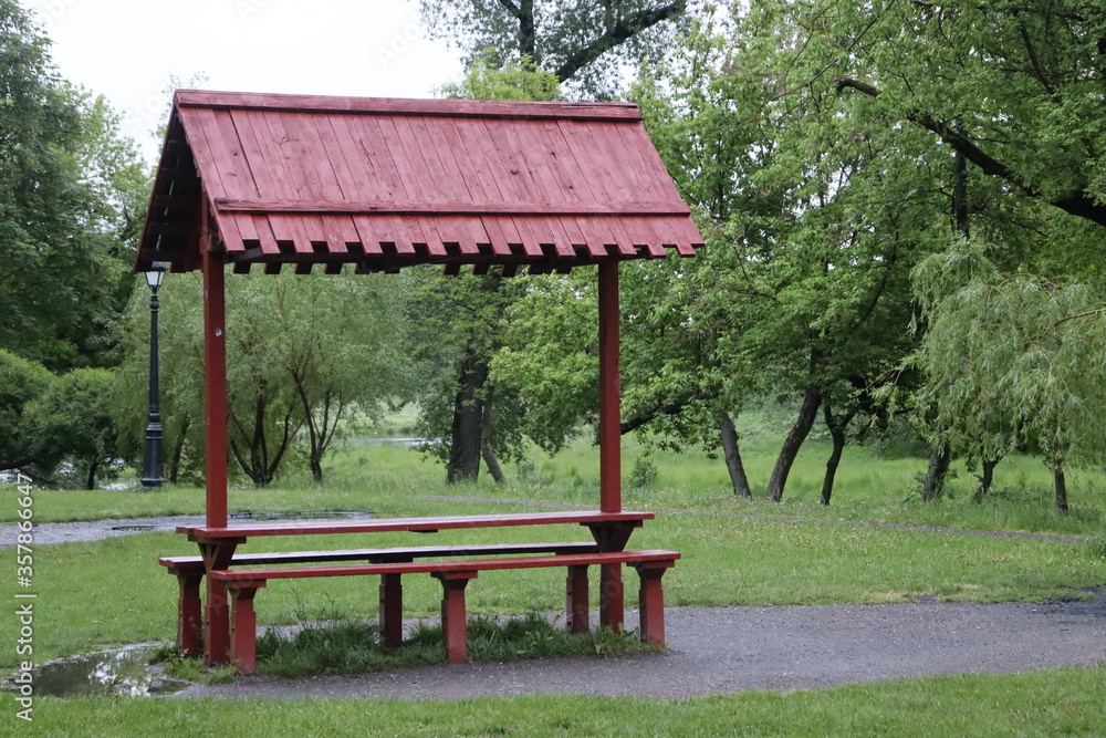 barbecue arbors in rainy park