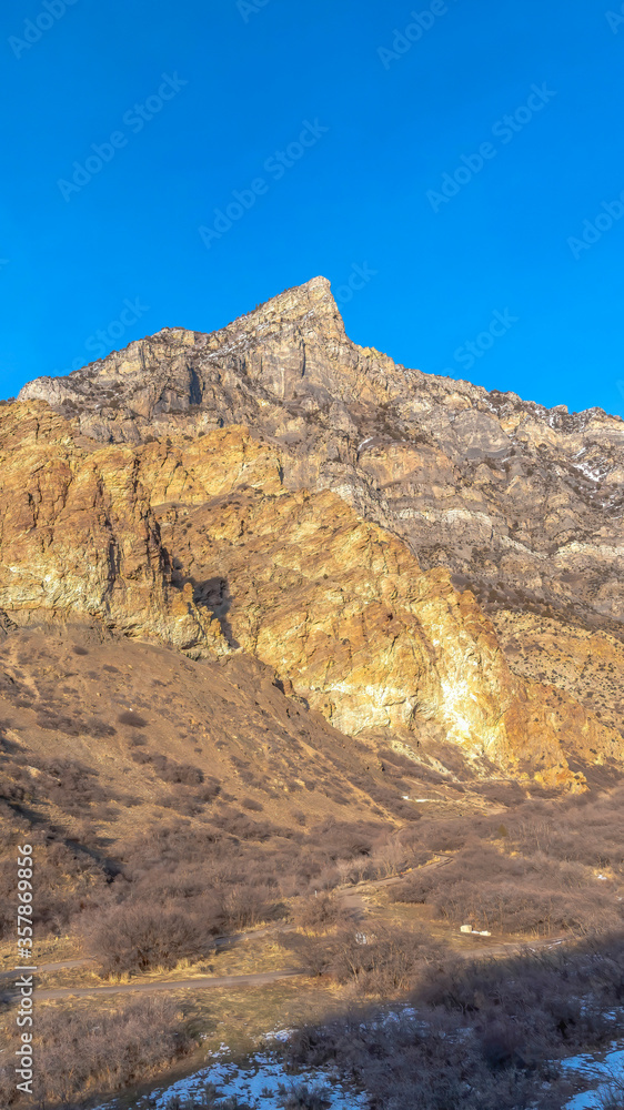 Vertical frame Nature landscape of rocky mountain terrain and blue sky in Provo Canyon Utah