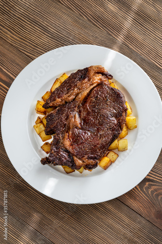 Beefsteak with fried potato