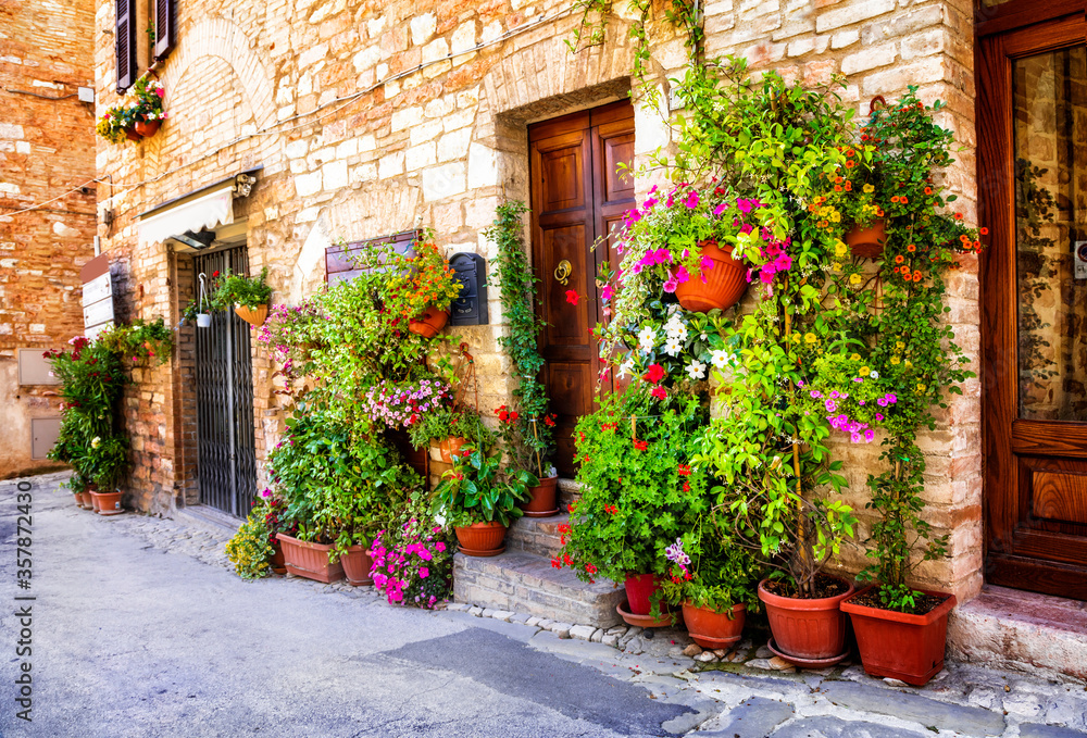 Charming old medieval villages of Italy with typical floral narrow streets. Spello , Umbria