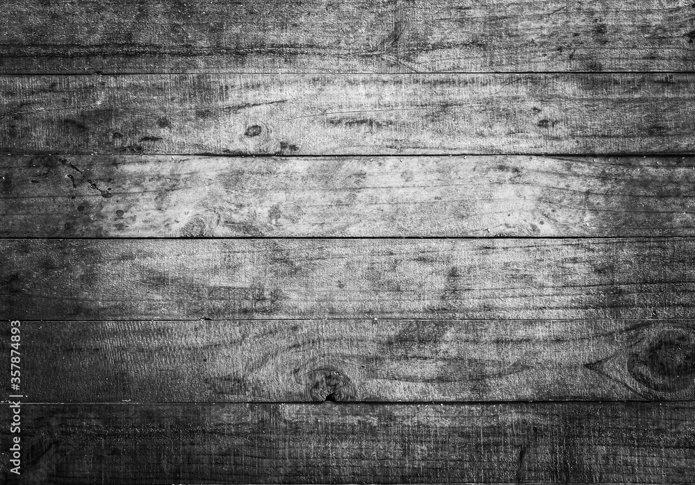 Obraz premium Old dark grunge wood background with knots and scratches. Wood plank texture of bark wood natural background.