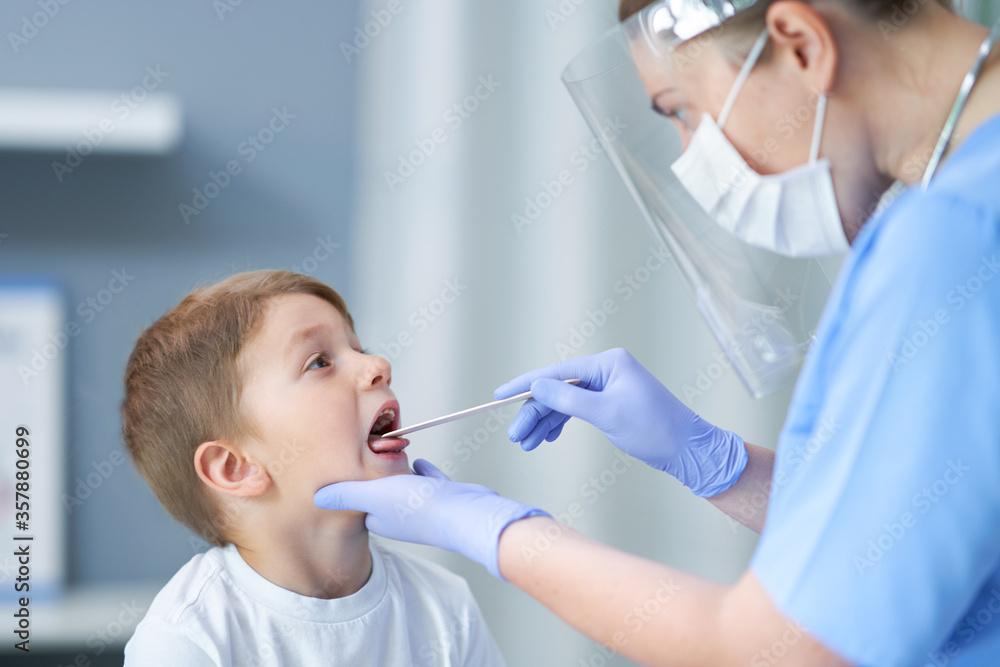 Portrait of adorable little boy having doctor's appointment Portrait of adorable little boy having doctor's appointment
