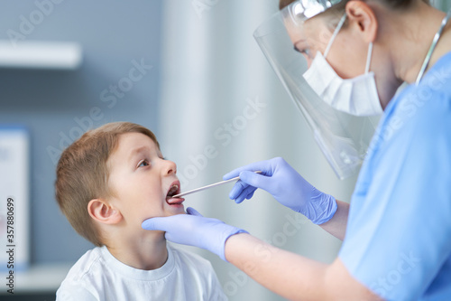Portrait of adorable little boy having doctor s appointment