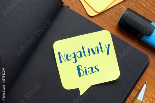 Fotografija Motivation concept about Negativity Bias with inscription on the page
