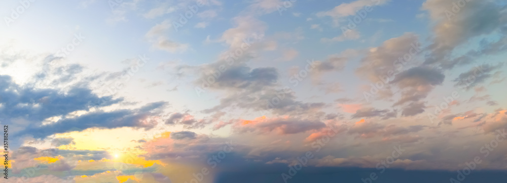 Beautiful panorama of the evening dramatic sky. Sunset or sunrise time. Amazing purple clouds. Beautiful panorama of the evening dramatic sky. Sunset or sunrise time. Amazing purple clouds.