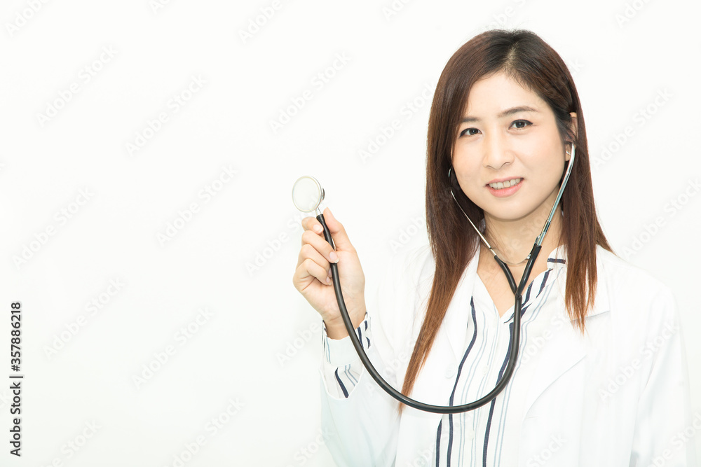 Happy smiling young beautiful female doctor showing stethoscope. Isolated over white background. asian. Happy smiling young beautiful female doctor showing stethoscope. Isolated over white background. asian.