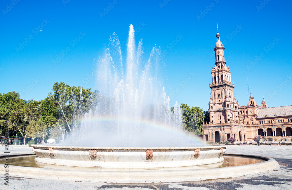 Rainwob in the fountain of Spanish square in Sevilla, Andalusia (Spain).