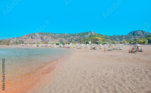 Holidaymakers sunbathing at  Iztuzu beach -  Dalyan  Turkey