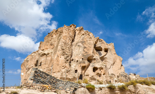 The ancient fortress Uchisar Castle were carved in natural rock formations in Cappadocia. this is a highest point in the region.Turkey. © Dmytro