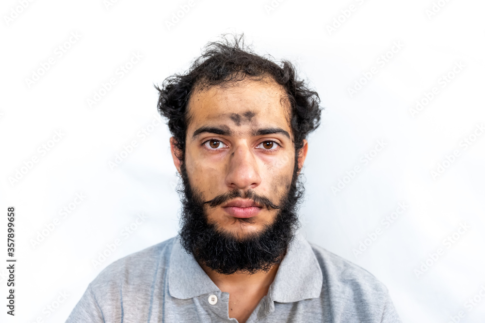 Arabic man with coal on his face having a bad day Arabic man with coal on his face having a bad day