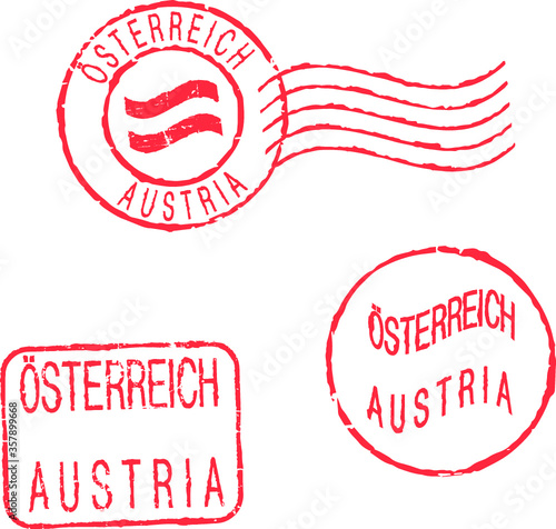 Red postal stamps 'AUSTRIA'. English and german inscription.