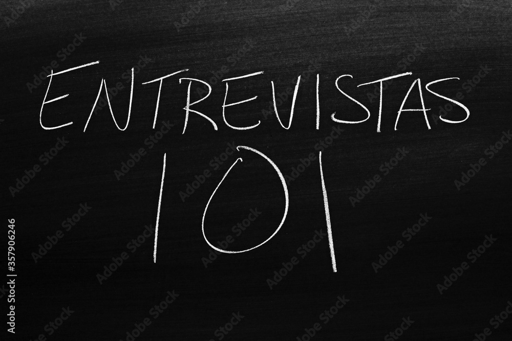 The words Entrevistas 101 on a blackboard in chalk. Translation: Interviews 101 The words Entrevistas 101 on a blackboard in chalk. Translation: Interviews 101