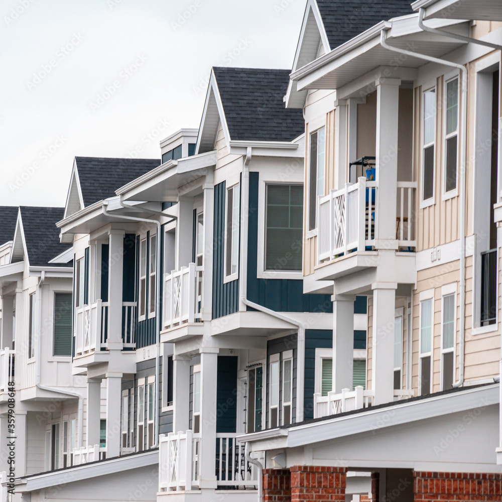 Square frame Row of new built American houses day light