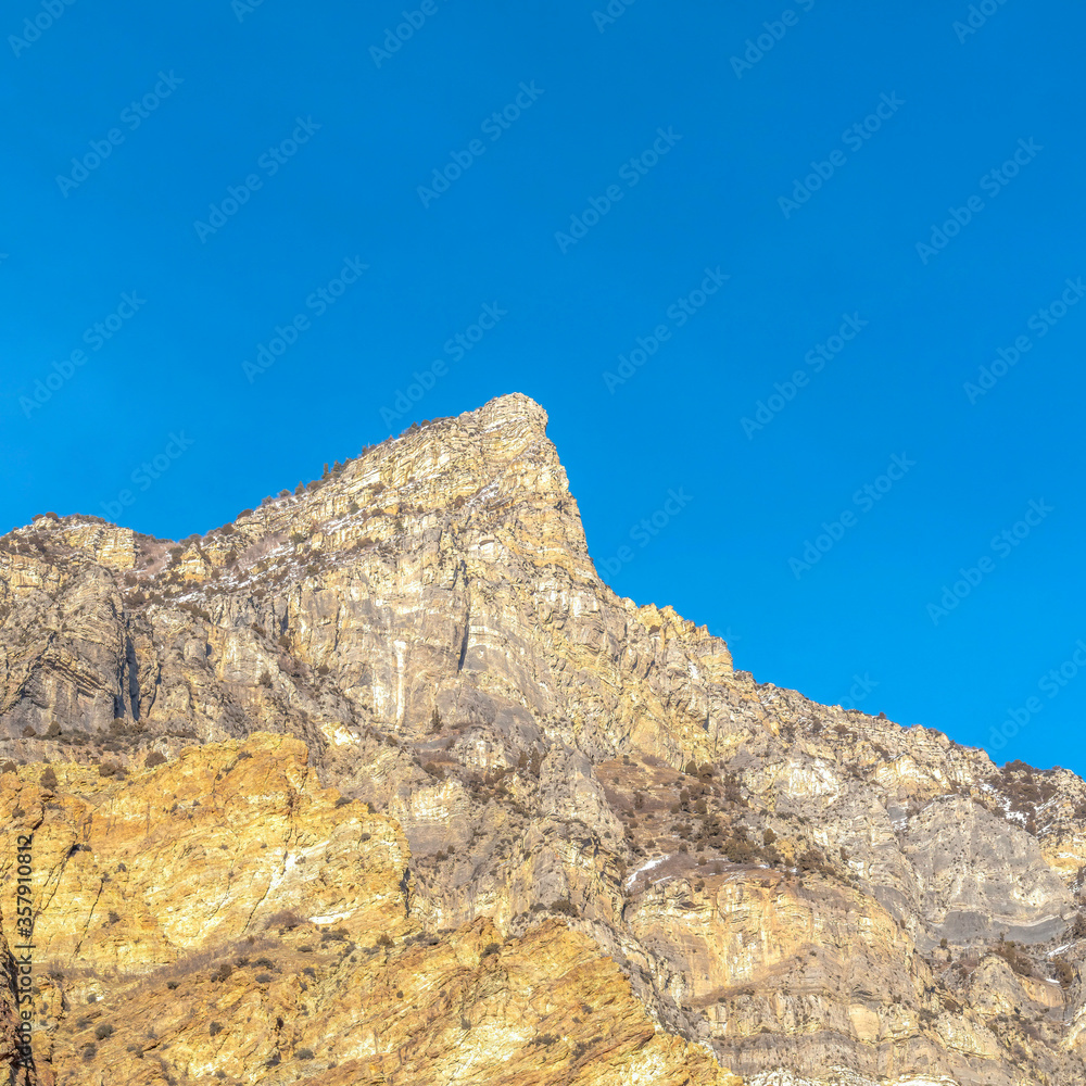 Square Peak of a rocky mountain with clear blue sky background in Provo Canyon Utah Square Peak of a rocky mountain with clear blue sky background in Provo Canyon Utah