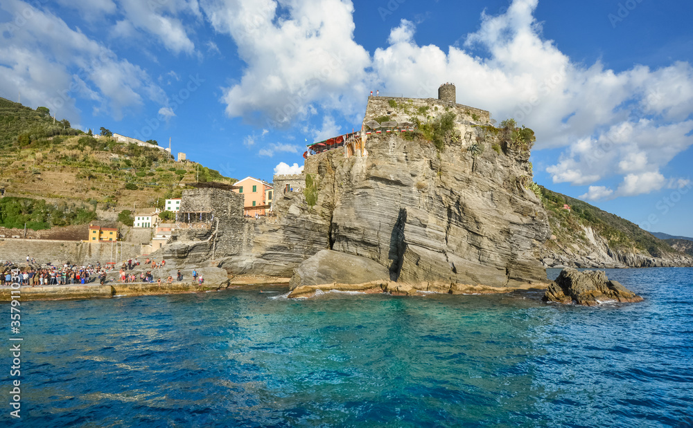 The Castello Doria, the ancient fort along the Ligurian Coast is visible from the sea at the fishing village of Vernazza, Italy, part of the Cinque Terre.