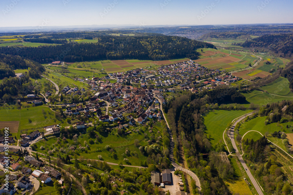 Aerial view of the villages Pfrondorf and Emmingen on a sunny day in Spring during the coronavirus lockdown.
