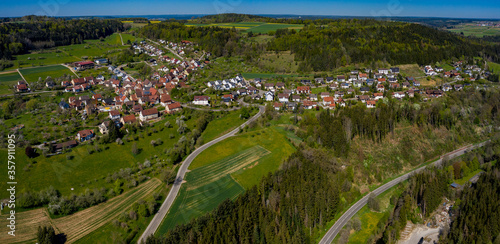 Aerial view of the villages Pfrondorf and Emmingen on a sunny day in Spring during the coronavirus lockdown.
 photo