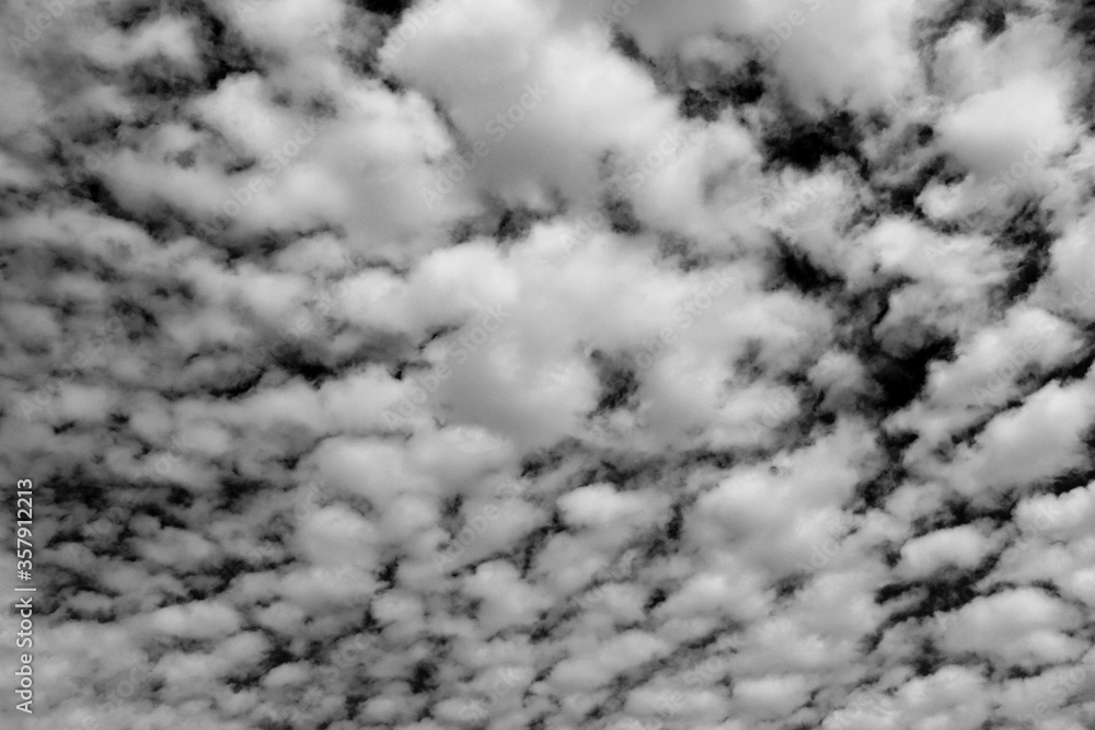 White clouds on sky , black and white photo