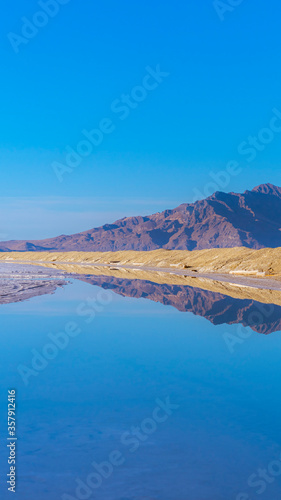 Vertical frame Reflection in still water at Bonnievale Salt Flats