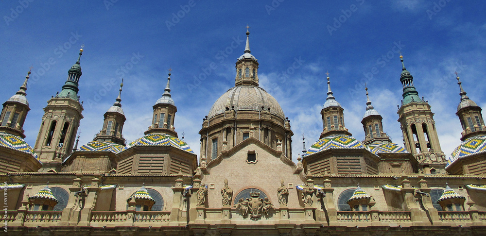 Baroque Basilica of El Pilar in Zaragoza. Spain.
Detail of the colorful tiled cupolas.