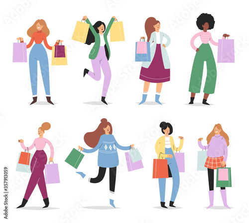 Collection of young women carrying paper shopping bags with purchases. Happy girls set taking part in seasonal sale, Black friday at store, shop, mall. Cartoon characters isolated on white background