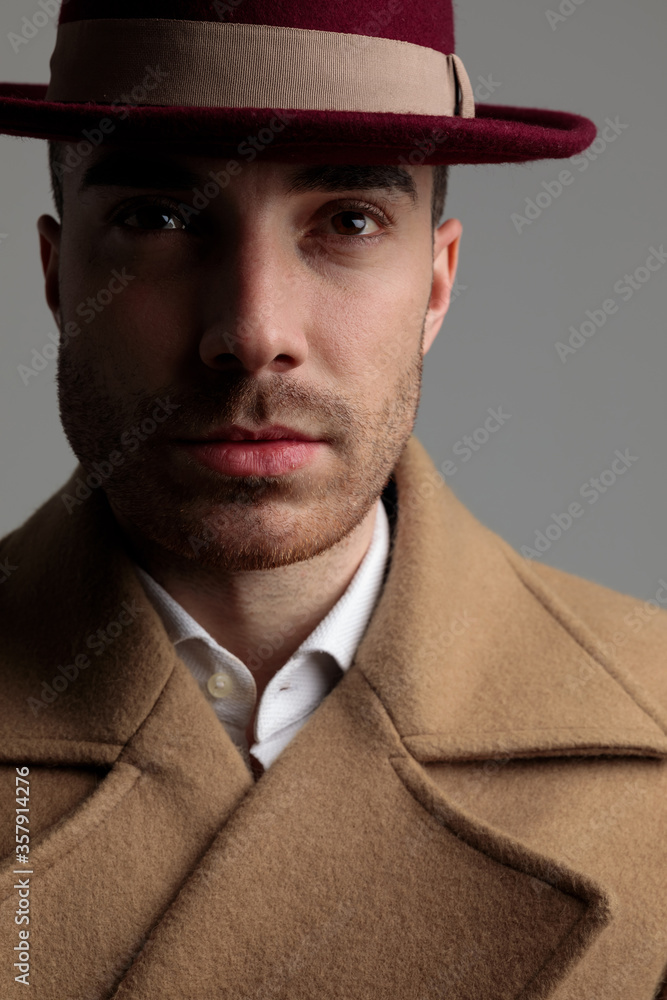 young smartcasual man looking up young smartcasual man looking up