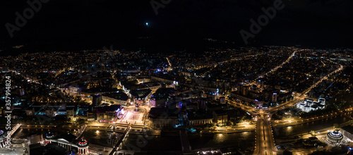 Large aerial panoramic shot of Skopje, North Macedonia at night. Night panorama of the city center of Skopje