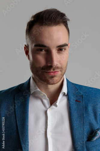 happy smartcasual man smiling and posing