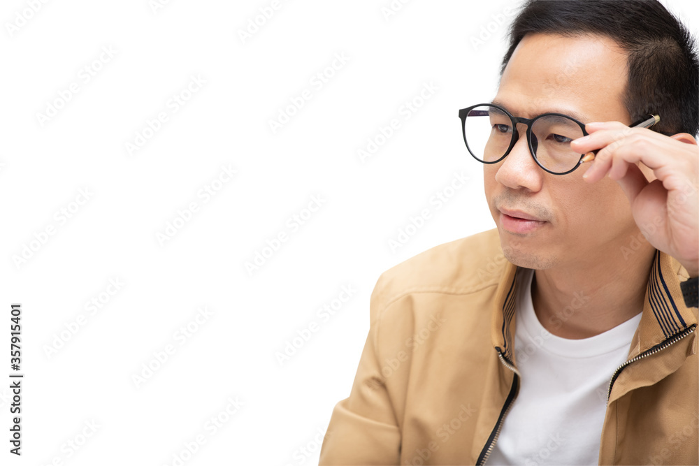 Asian man Talking and using laptop communicates on the internet with the customer. concept work from home. Asian man Talking and using laptop communicates on the internet with the customer. concept work from home.
