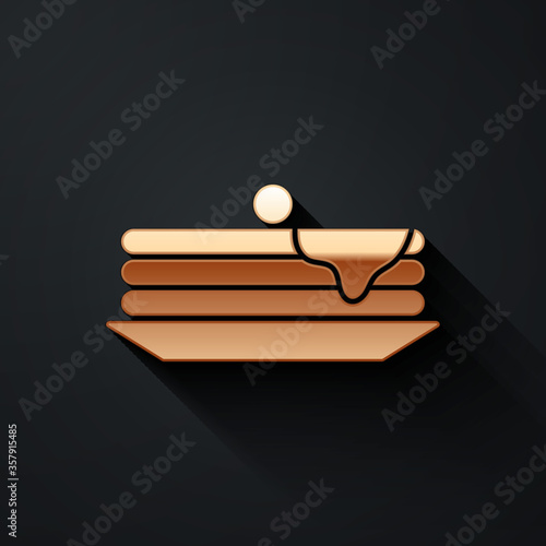 Gold Stack of pancakes icon isolated on black background. Baking with syrup and cherry. Breakfast concept. Long shadow style. Vector Illustration