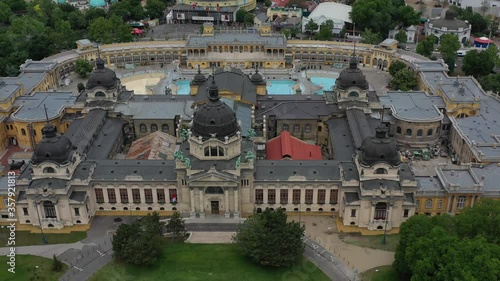 One of the largest spa complexes of the Szechenyi Thermal Bath in the Budapest City Park. In the background is the capital's Great Circus, as well as the capital's Zoo. Budapest, Hungary / 06.11.2020.