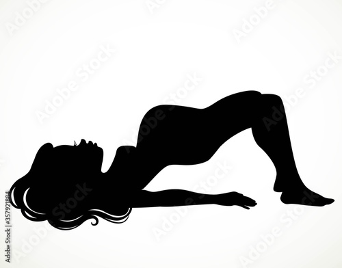 Black silhouette of a beautiful pregnant woman doing yoga traini