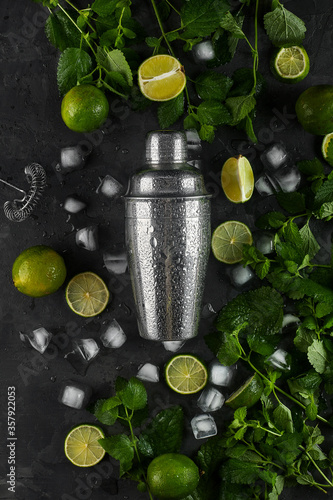 Summer Refreshing Classic Mojito Cocktail. Ingredients: lime, mint, cane sugar, ice. Shaker, strainer. Cuban national drink.