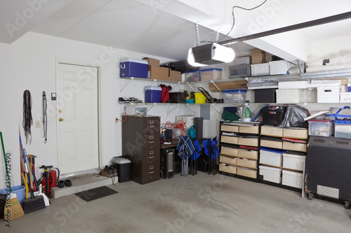 Typical suburban garage full of boxes and storage items. Fototapet