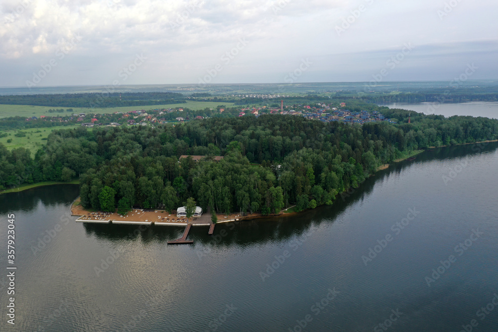 boat mooring on the river at sunrise filmed from a drone