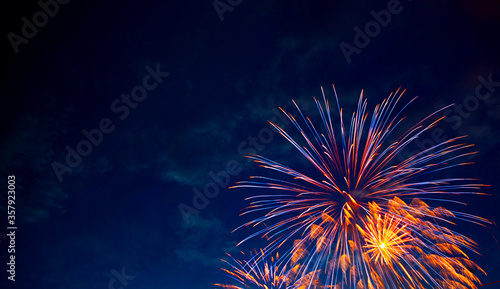 Fireworks display. 4th July fireworks. Fireworks display on dark sky background.