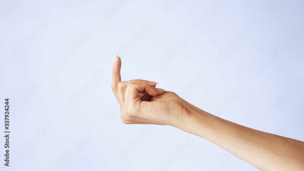 Beckoning sign. Come here. Single handed gesture. closeup. Isolated on white background