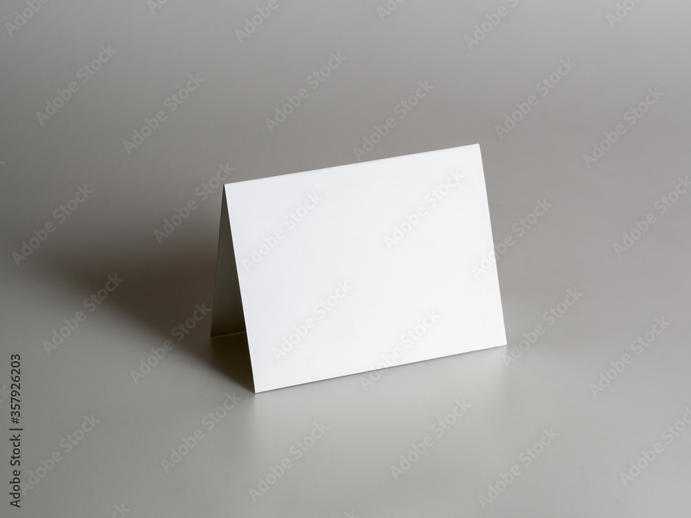 Blank, paper, white card for your design on a gray background. Mock-up. Stylized stock photos. Blank, paper, white card for your design on a gray background. Mock-up. Stylized stock photos.