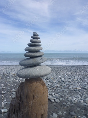 a pile of stones at the Okarito Beach on the South Island in New Zealand  March