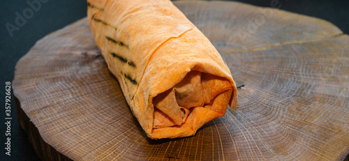 Shawarma on a wooden board photo