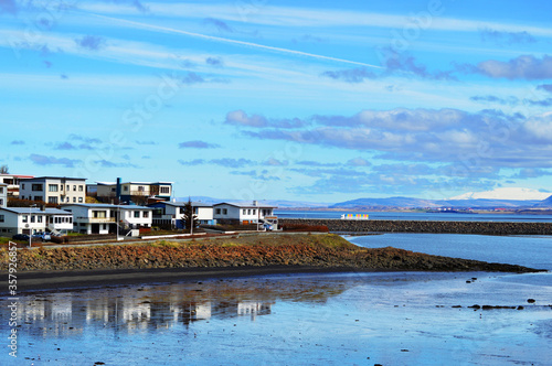 Cute Borgarnes town in Iceland at a fiord and sea reflection © Nacho Á Ortiz-Repiso