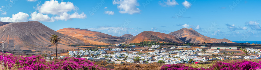 Landscape with small village on Lanzarote island in Timanfaya national park, Canary islands, Spain.