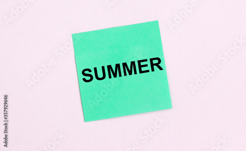 summer time word written on mint sticky notes. isolated on white photo