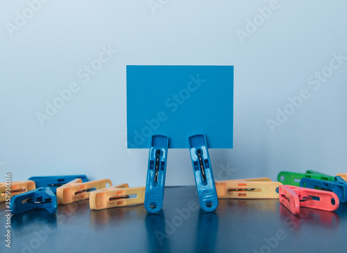 Multiple clamps hold lettering paper