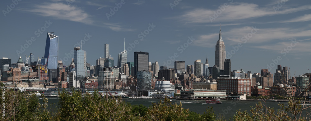 Obraz premium Panoramic sunset view of Manhattan skyline from Hoboken. New York. USA.