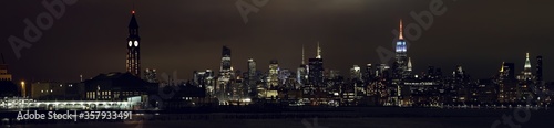 Panoramic night view of Manhattan skyline from Jersey City. New York. USA.