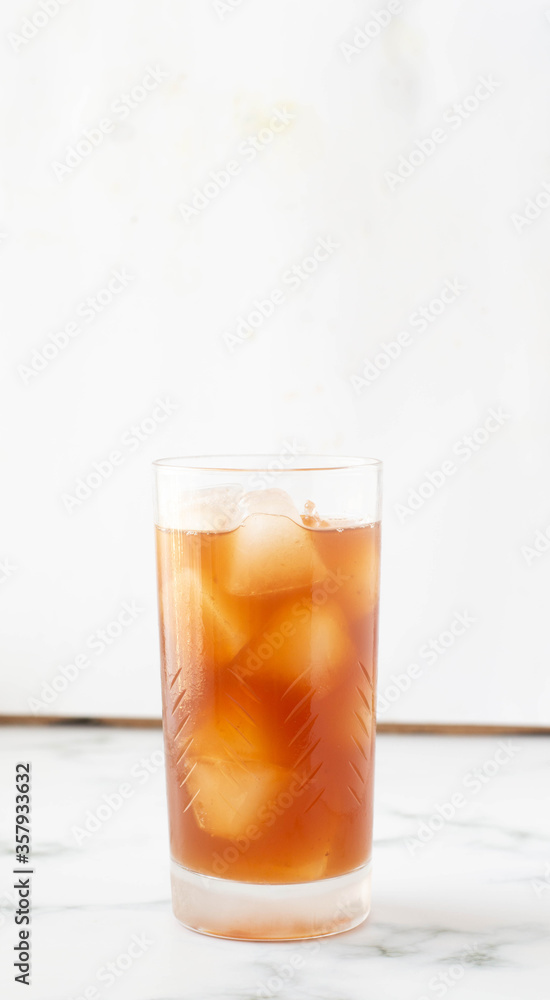 Homemade iced lemonade with ripe peaches. Fresh peach ice tea in a mason jar. Homemade iced lemonade with ripe peaches. Fresh peach ice tea in a mason jar.