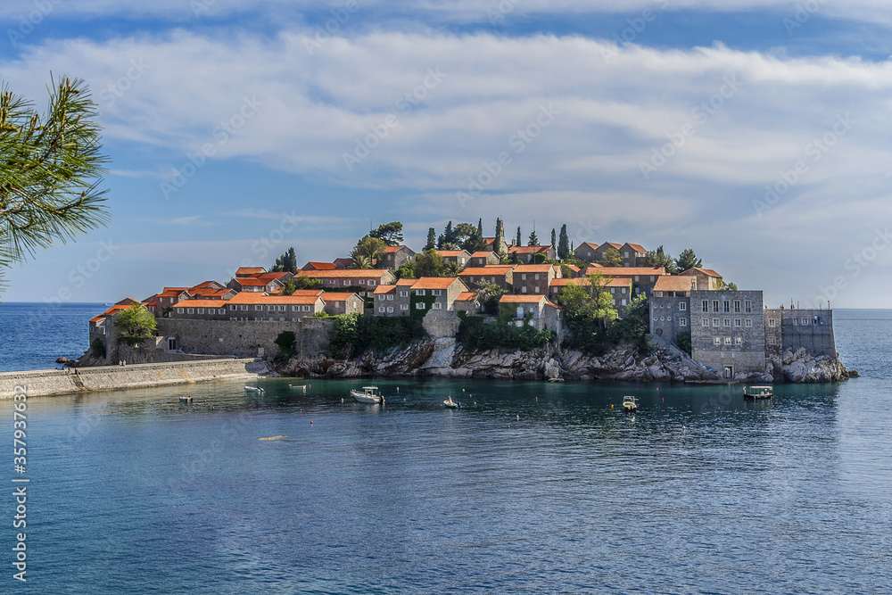 Famous Sveti Stefan (now Aman Sveti Stefan) - small islet and Luxury hotel resort in Montenegro, approximately 6 kilometers southeast of Budva. Montenegro, Europe.